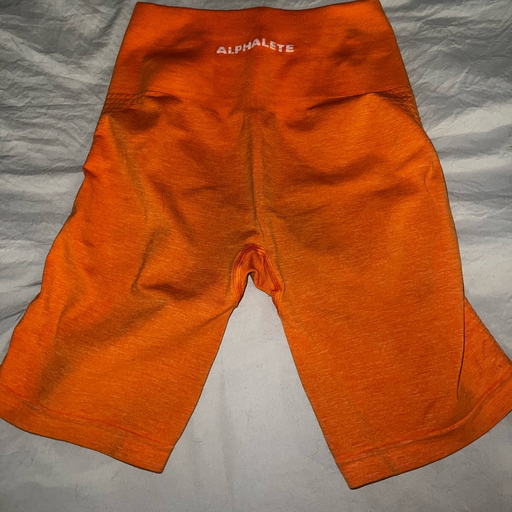 Orange Alphalete Biker Shorts